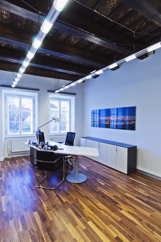 interior of a modern office with a curved desk