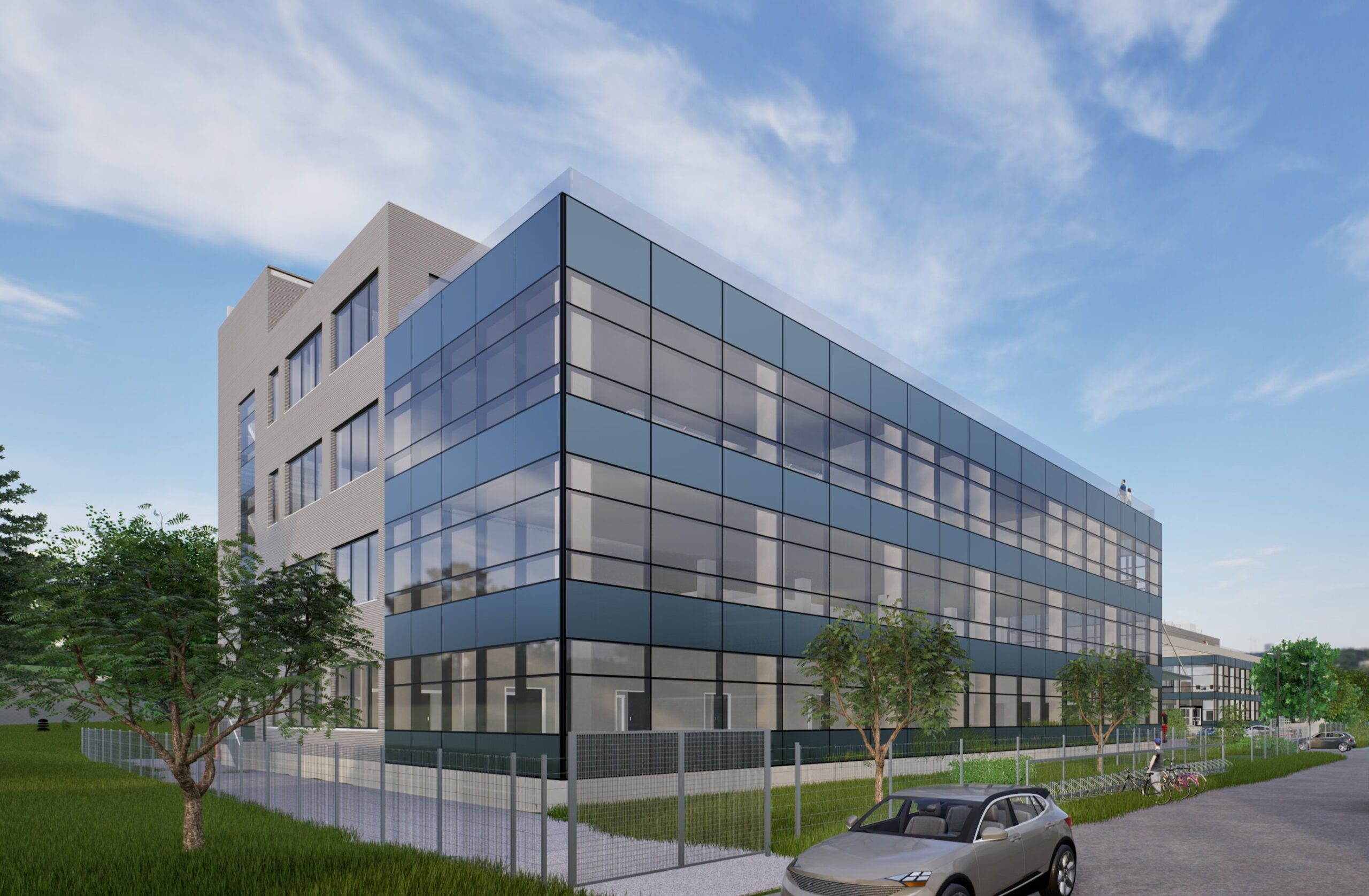 Výstavba nového servisního a výrobního areálu pro společnost Olympus Medical Products Czech v Přerově postupuje podle plánu. DELTA Group CZ stojí za tímto projektem v roli generálního projektanta – od architektonické studie přes zpracování projektové dokumentace včetně dokumentace pro stavební povolení (DSP) až po koordinaci realizace. Nyní na stavbě působíme také jako technický dozor investora (TDI): kontrolujeme kvalitu prováděných prací, dohlížíme na dodržování projektové dokumentace, řídíme časový harmonogram a komunikujeme se zhotovitelem.
Projekt zahrnuje výstavbu zcela nové čtyřpatrové budovy C, renovaci s nástavbou budovy B a rekonstrukci budovy A. (Budovy dle vizualizace zleva v pořadí C, B, A.) Budova C představuje největší a klíčovou část celé kampusové expanze – je určena pro logistiku, výrobu, servis a administrativu. Celková plocha areálu činí přibližně 12 200 m².